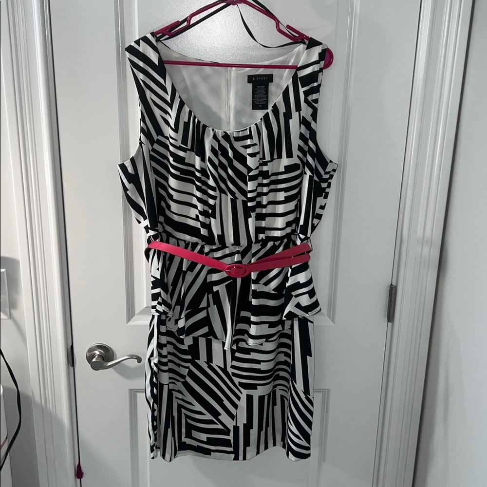 B. Smart sleeveless Dress with Pink belt